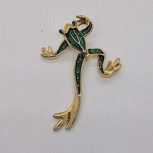 gold tone and green enamel articulated frog brooch